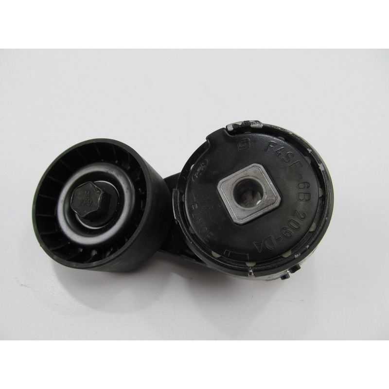 NEW UNBOXED OEM Ford F4SE-6B209-DA Belt Tensioner Assembly