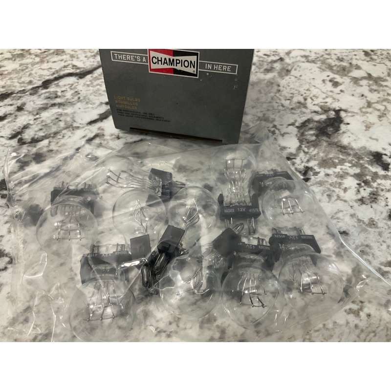 (10) Champion 4157LL Turn Signal Light Bulb - Miniature Lamp GT8, Made By Wagner